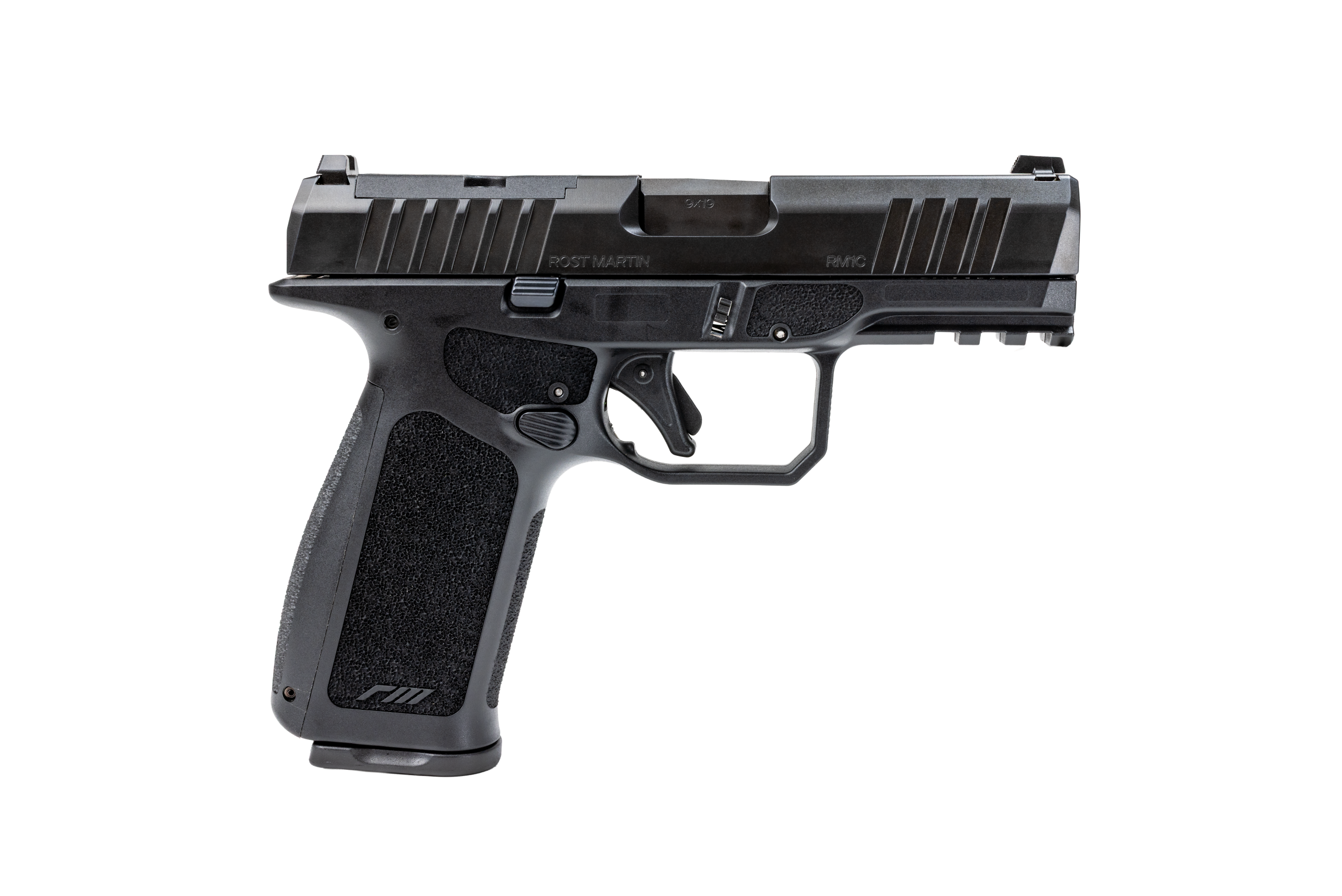 RM1X, black striker-fired pistol with a compact slide and a full-size grip.