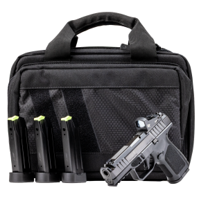 RM1C Comp compact compensated striker-fired pistol with additional mags, bag, and optic